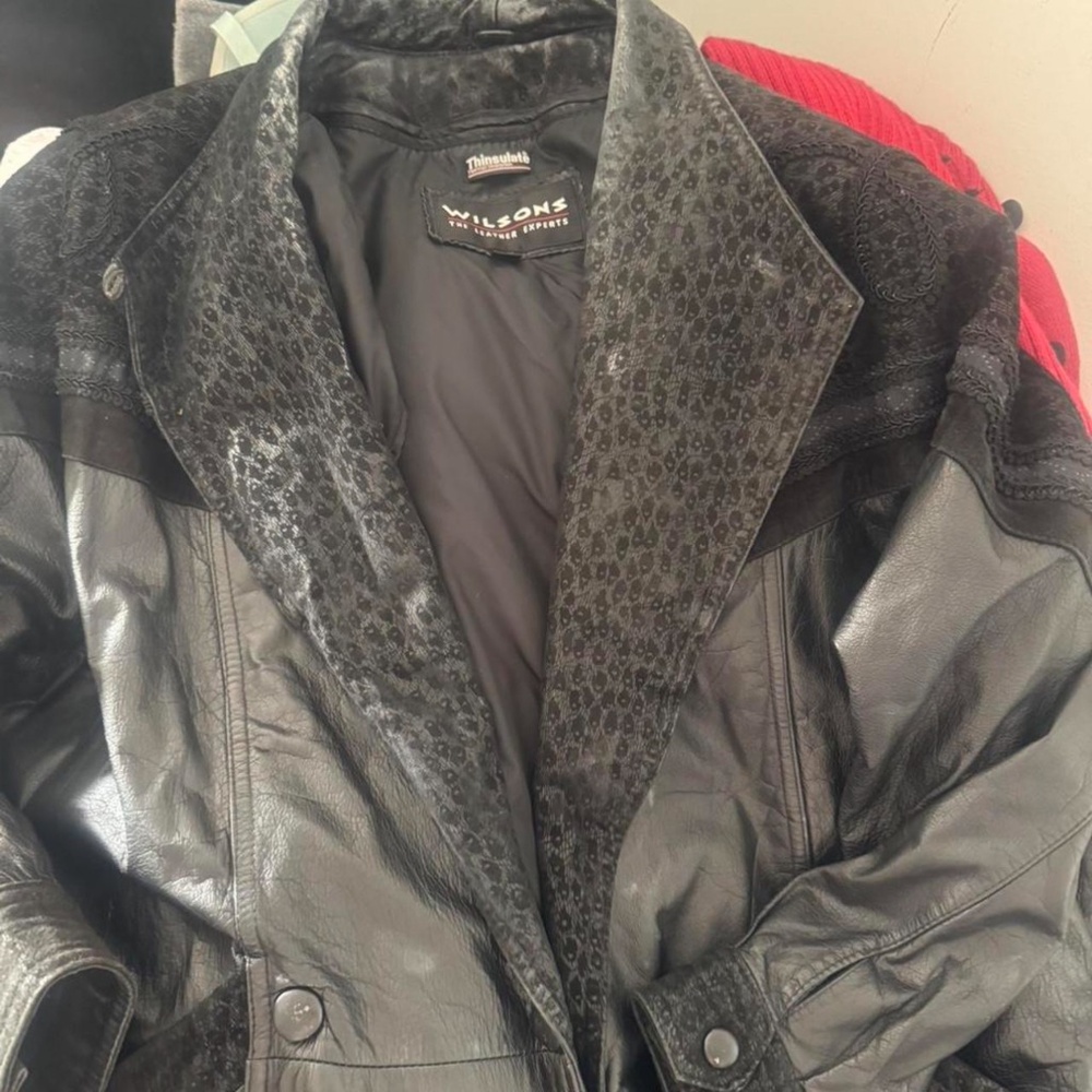 Y2K Wilson’s leather  one X trenchcoat with a fur trim around the collar and res